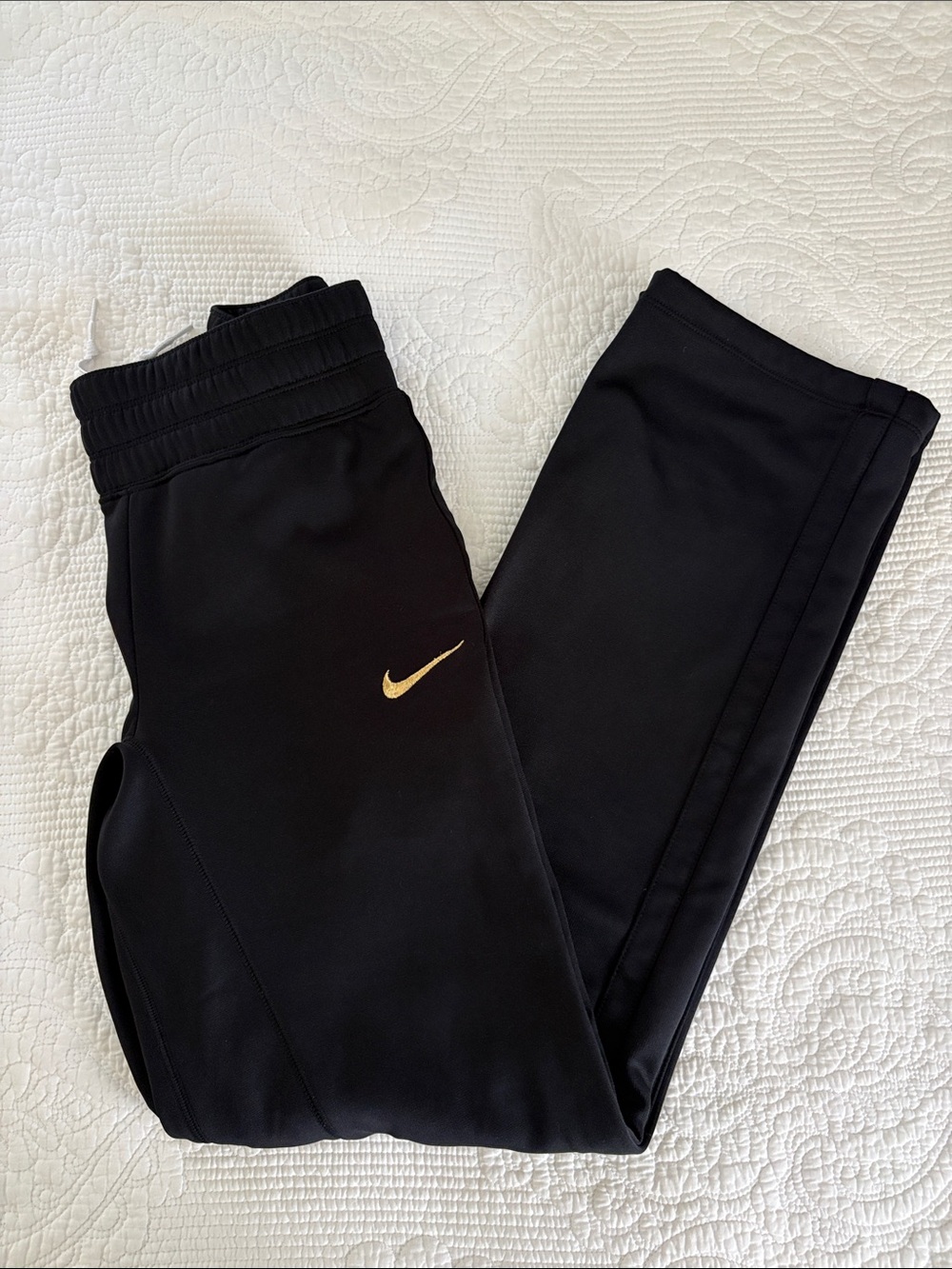 Nike Black Jogger Pants with Gold Swoosh Accent